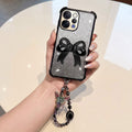 Vivo V70 5G Luxury Shimmer Airbag Bow Stand Case with Charm Strap