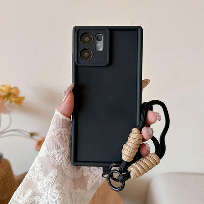 Black phone case with a handle held by a hand against a neutral background