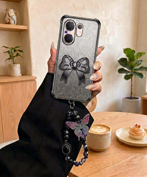 Vivo V60 5G Luxury Shimmer Airbag Bow Stand Case with Charm Strap